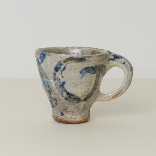 CUP WITH ABSTRACT PATTERN