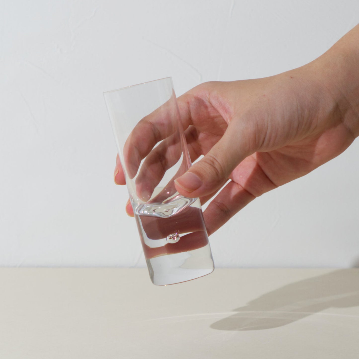 GLASS CUP WITH SMALL BUBBLE