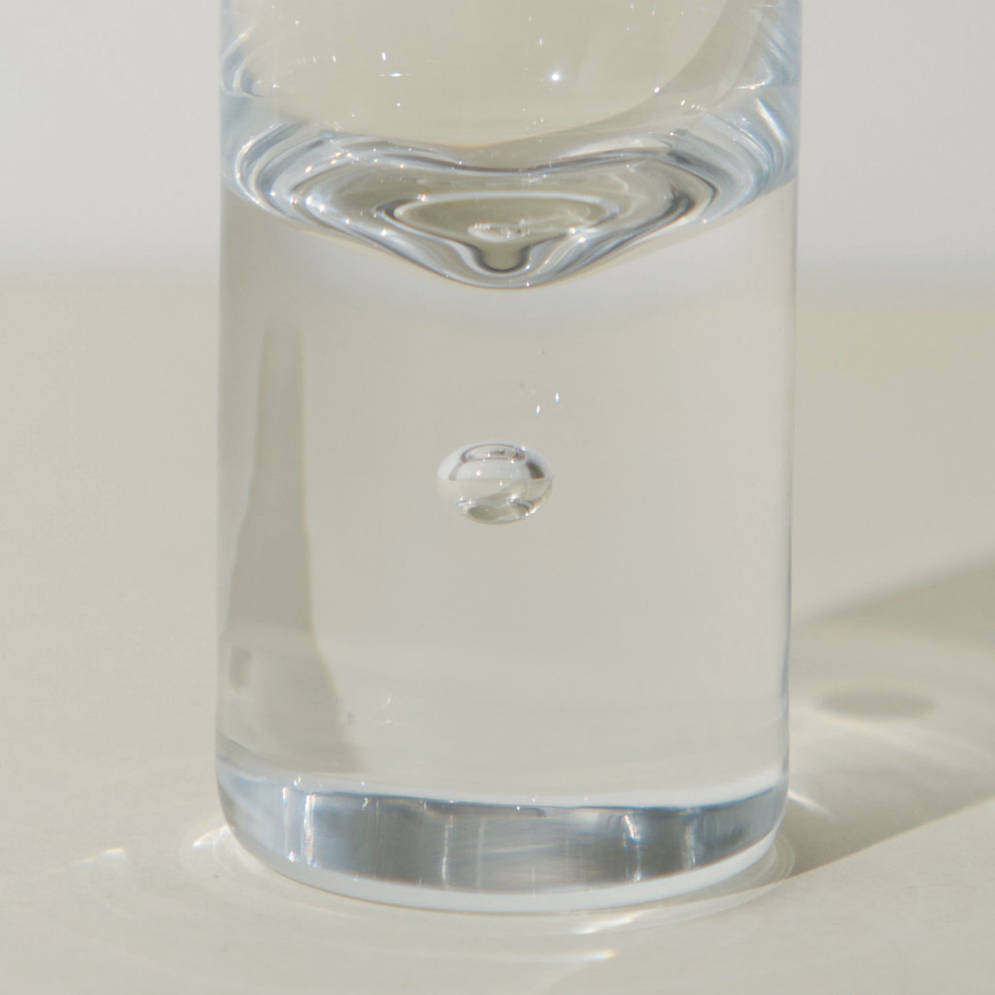 GLASS CUP WITH SMALL BUBBLE